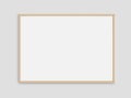 Landscape photo frame mockup on white blank wall