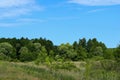 Landscape Photo - Green Field, Clouds And Blue Sky. Nature, Ecology, Travel Concept. Royalty Free Stock Photo