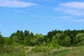 Landscape Photo - Green Field, Clouds And Blue Sky. Nature, Ecology, Travel Concept. Royalty Free Stock Photo