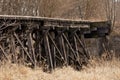 Abandoned train trestle bridge in the woods Royalty Free Stock Photo