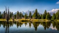 Landscape Photo of the view of the Grand Tetons from Schwabacher Landing in Grand Teton National Park Royalty Free Stock Photo