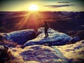 Landscape Photographer climbed on peak for photographing the sunrise