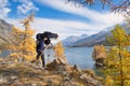 Landscape photographer under the plate camera curtain Royalty Free Stock Photo