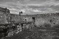 Landscape photographers on top of wall remains of Lindelbrunn castle ruin in Germany