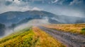 Landscape photography. Captivating summer scene of Krasna range with old country road. Royalty Free Stock Photo