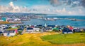 Landscape photography. Captivating summer sityscape of Torshavn town.