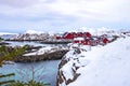 Landscape photography. Cloudy winter view of Nusfjord town, Norway, Europe. Morning scene of Lofoten Islands. Norwegian seascape Royalty Free Stock Photo