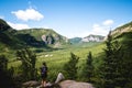 A landscape photography with mountains and clouds