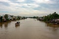 A landscape pictures of the shores of the mekong river in south vietnam near vinh long on a sunny summer day Royalty Free Stock Photo