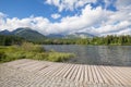 The landscape of the picturesque lake strbske pond surrounded by mountain peaks and canyons Royalty Free Stock Photo