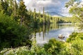 The landscape of the picturesque lake, surrounded by mountain peaks and canyons Royalty Free Stock Photo