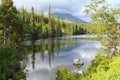 Landscape of the picturesque lake surrounded by mountain peaks and canyons Royalty Free Stock Photo