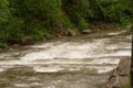 Landscape, a picturesque mountain river with bubbling water.