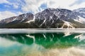 Landscape of Plansee lake and Alps mountains in winter, evening view, Tyrol, Austria.