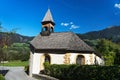 Landscape protection area AchstÃÂ¼rze. Blasius chapel in Oetz-Piburg, alps in background. Royalty Free Stock Photo