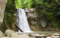 The landscape of Pruncea waterfall and the Casoca river in the Buzau mountains, Romania. A beautiful cascade in the forest