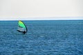 Landscape of the Puck Bay in Poland with windsurfingfloating on the water