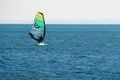 Landscape of the Puck Bay in Poland with windsurfingfloating on the water