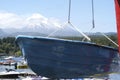 Landscape of Pucon volcano erupting and lake Villarrica and Marina with yachts Royalty Free Stock Photo