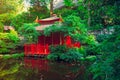 Landscape with Red wooden house in the beautiful japanese style garden, park with pond. Traditional japan architecture. Exterior Royalty Free Stock Photo