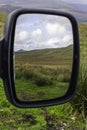 Landscape reflection in car mirror Royalty Free Stock Photo