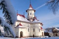 Landscape of a religious transilvanian romanian white monastery built in a rustic style