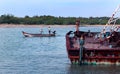 A landscape of the river arasalaru with old and new boats near karaikal beach. Royalty Free Stock Photo