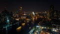 Landscape of river in Bangkok cityscape in night time. Bangkok city night at rooftop view, chao phraya river the office buildings Royalty Free Stock Photo