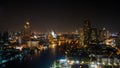 Landscape of river in Bangkok cityscape in night time. Bangkok city night at rooftop view, chao phraya river the office buildings Royalty Free Stock Photo