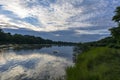 A river landscape on the background of evening sky and clouds Royalty Free Stock Photo