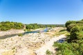 Landscape with a River Gard near the famous aqueduct Pont du Gard, France Royalty Free Stock Photo