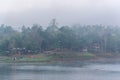 Landscape of river and houseboat with morning mist Royalty Free Stock Photo