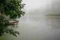 Landscape with a river in the morning mist Royalty Free Stock Photo