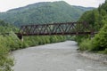 Landscape with a river and a railway bridge in the Ukrainian Carpathians Royalty Free Stock Photo