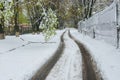 Landscape with road after April snow storm in Dnepr city, Ukraine