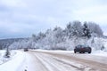 Landscape Road in the winter forest with snow covered