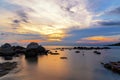 Landscape rock with wave sunset at the seashore nature