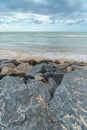 Landscape of rocks in front of the beach Royalty Free Stock Photo