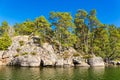 Landscape with rocks and trees on an island near VÃÂ¤stervik in Sweden Royalty Free Stock Photo