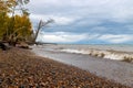 Landscape of a rocky shore of Lake Superior under a cloudy sky in autumn in Michigan, the US Royalty Free Stock Photo