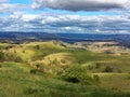 Landscape rolling hills Australian country with estates far view Royalty Free Stock Photo