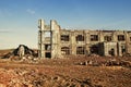 Landscape of ruined buildings at sunset, image of decrepitude or natural disaster Royalty Free Stock Photo