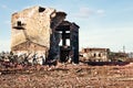 Landscape of ruined buildings at sunset, image of decrepitude or natural disaster Royalty Free Stock Photo