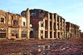 Landscape of ruined buildings at sunset, image of decrepitude or natural disaster Royalty Free Stock Photo