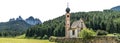 Landscape with San Giovanni or St Johann in Ranui chapel, Funes Valley, Dolomites Alps, Italy isolated on white background Royalty Free Stock Photo