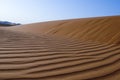 Landscape of sand dunes in the desert of Rub` Al Khali Royalty Free Stock Photo