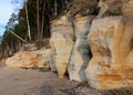 landscape with sandstone cliffs, bare ice, sand and ice formations, Veczemju cliffs, Latvia