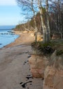 landscape with sandstone cliffs, bare ice, sand and ice formations, Veczemju cliffs, Latvia