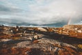 Landscape scandinavian mountains plateau and rainbow