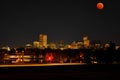 Landscape scene of Beaver Blood Moon over Denver, Colorado at night Royalty Free Stock Photo